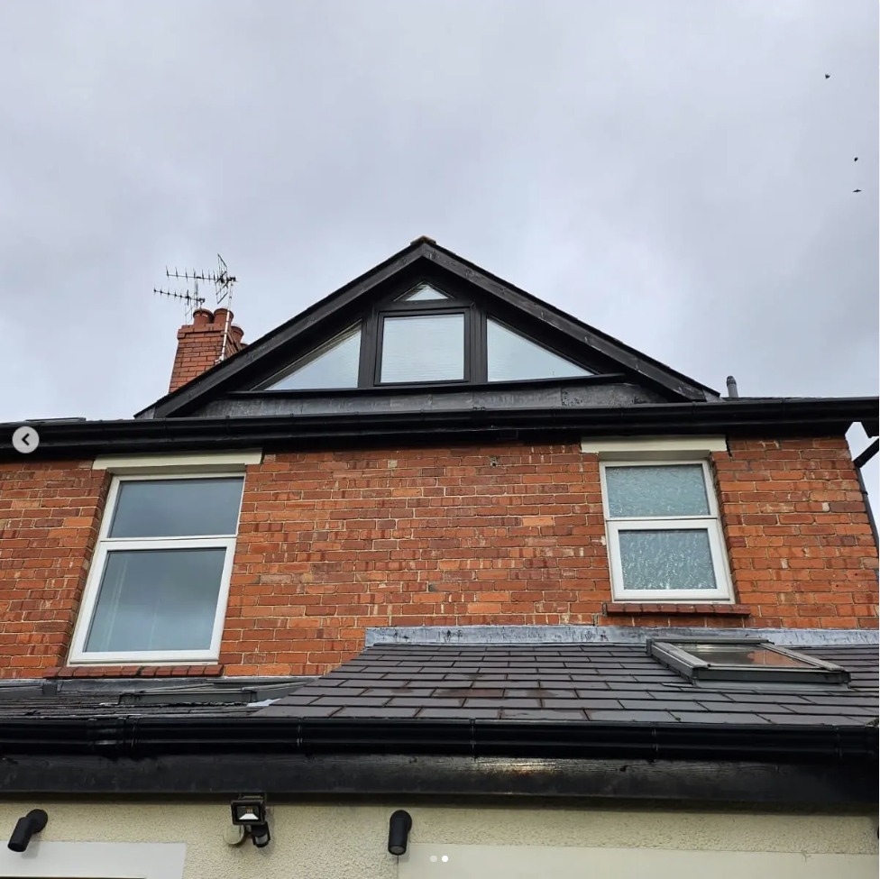Before — Black uPVC replacement windows
